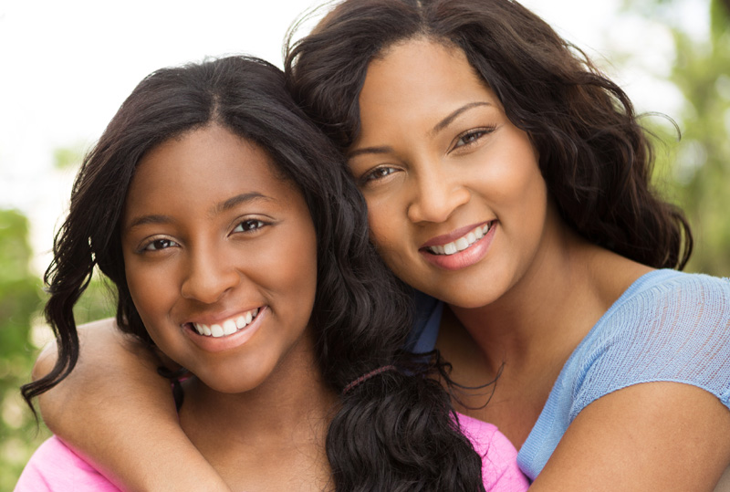 Mother and Daughter Smiling 